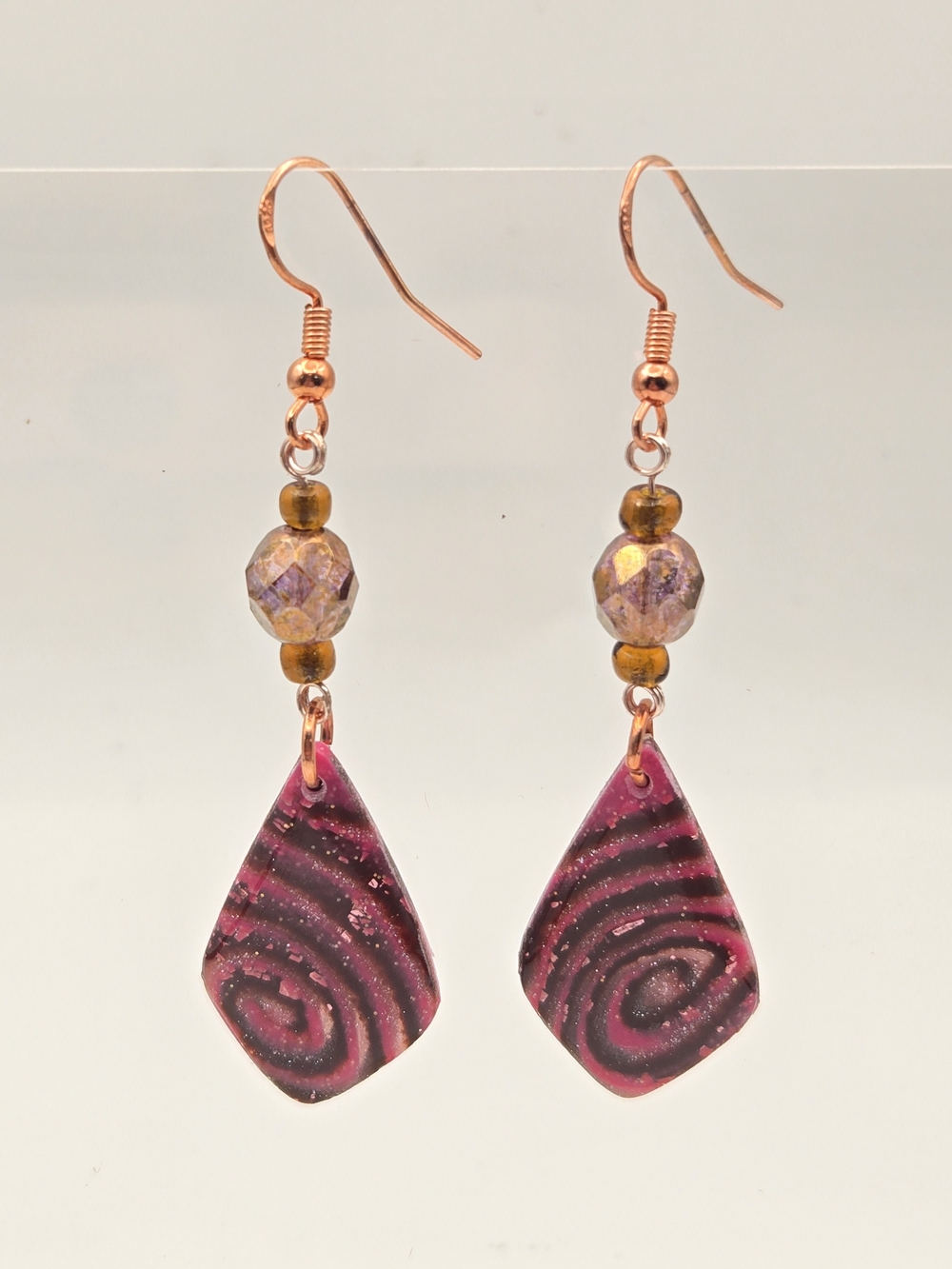 Handcrafted Rose Pink Swirl Drop Earrings with Faceted Accents